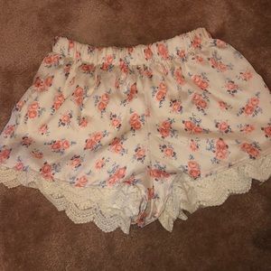 Floral silk and lace shorts.